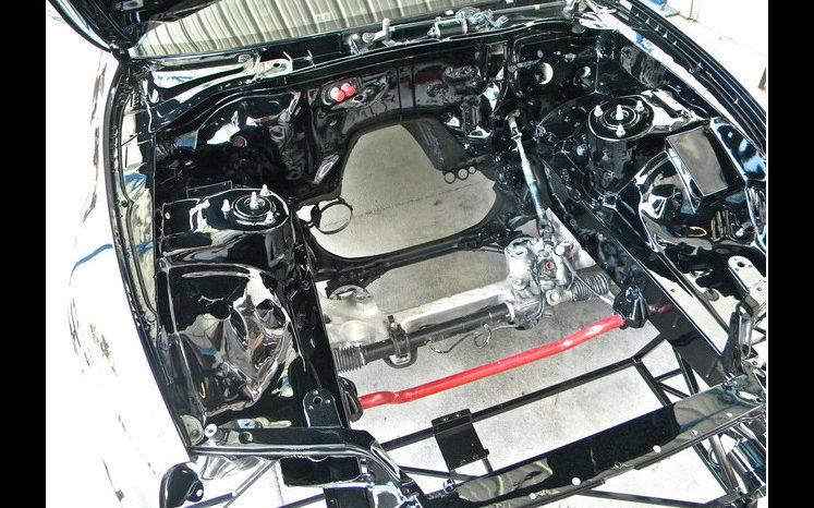 Gloss-black engine bay: Paint & surface detail